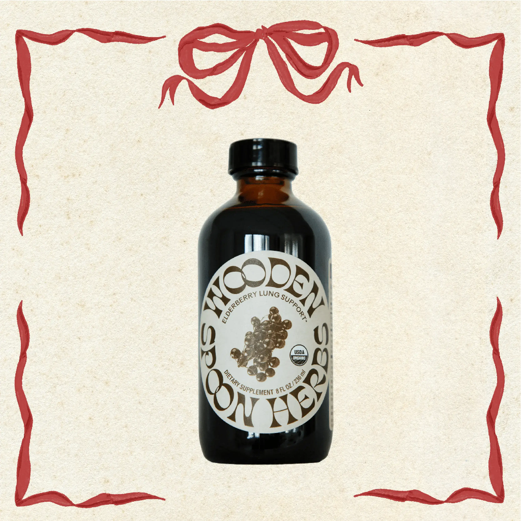 Bottle of WSH Elderberry Support on a beige background with decorative red border