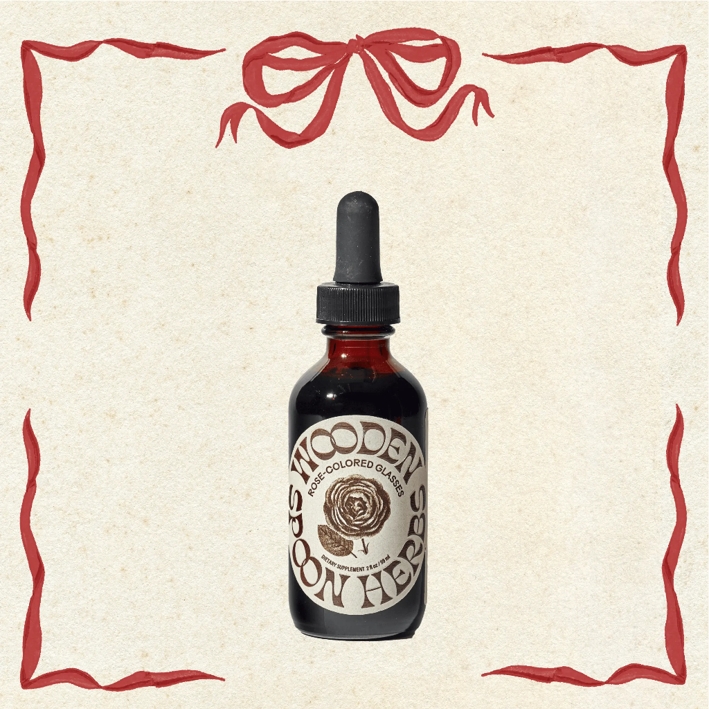 Bottle of Rose Colored Glasses Tincture by Wooden Spoon Herbs with decorative border 