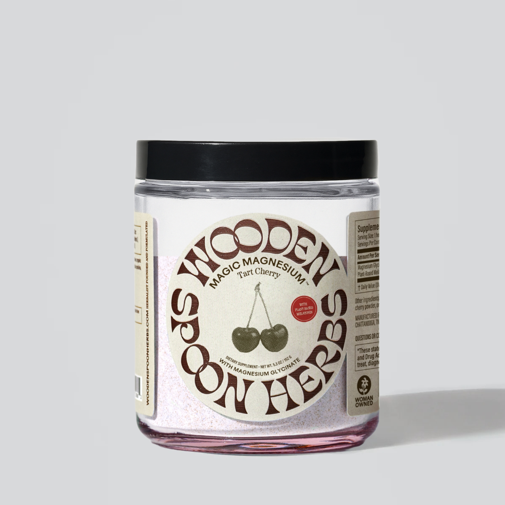Jar of Wooden Spoon Herbs Magic Magnesium Tart Cherry on a light gray background